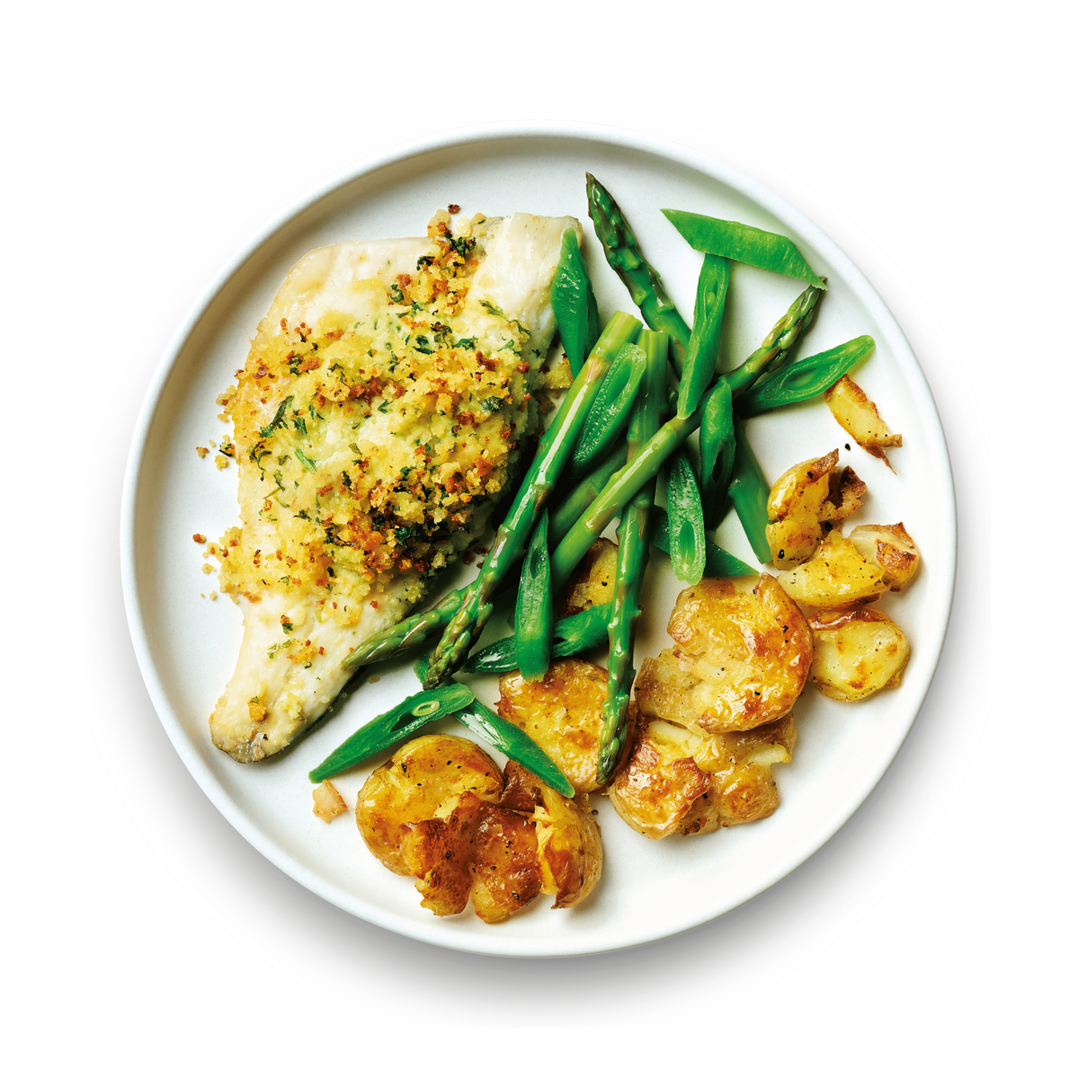 Fred's pesto sea bass with crispy smashed potatoes and steamed veg